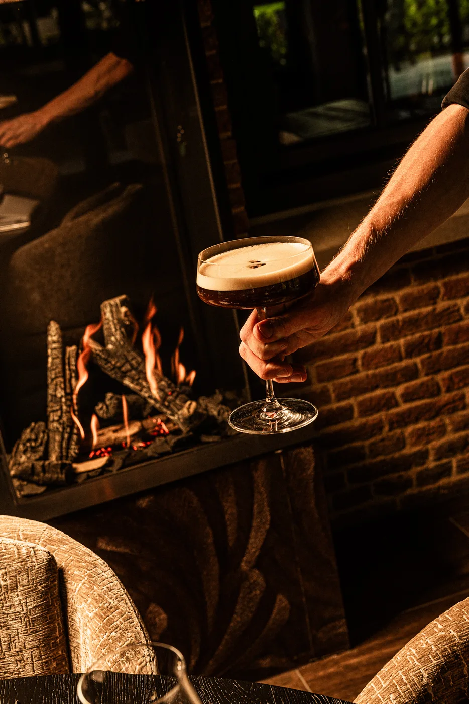 An espresso martini by the fire